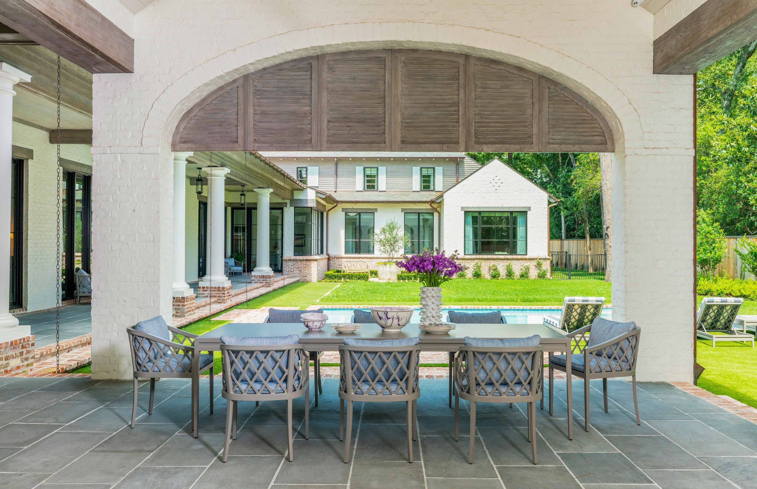 outdoor dining set with pool and yard - Creative Tonic