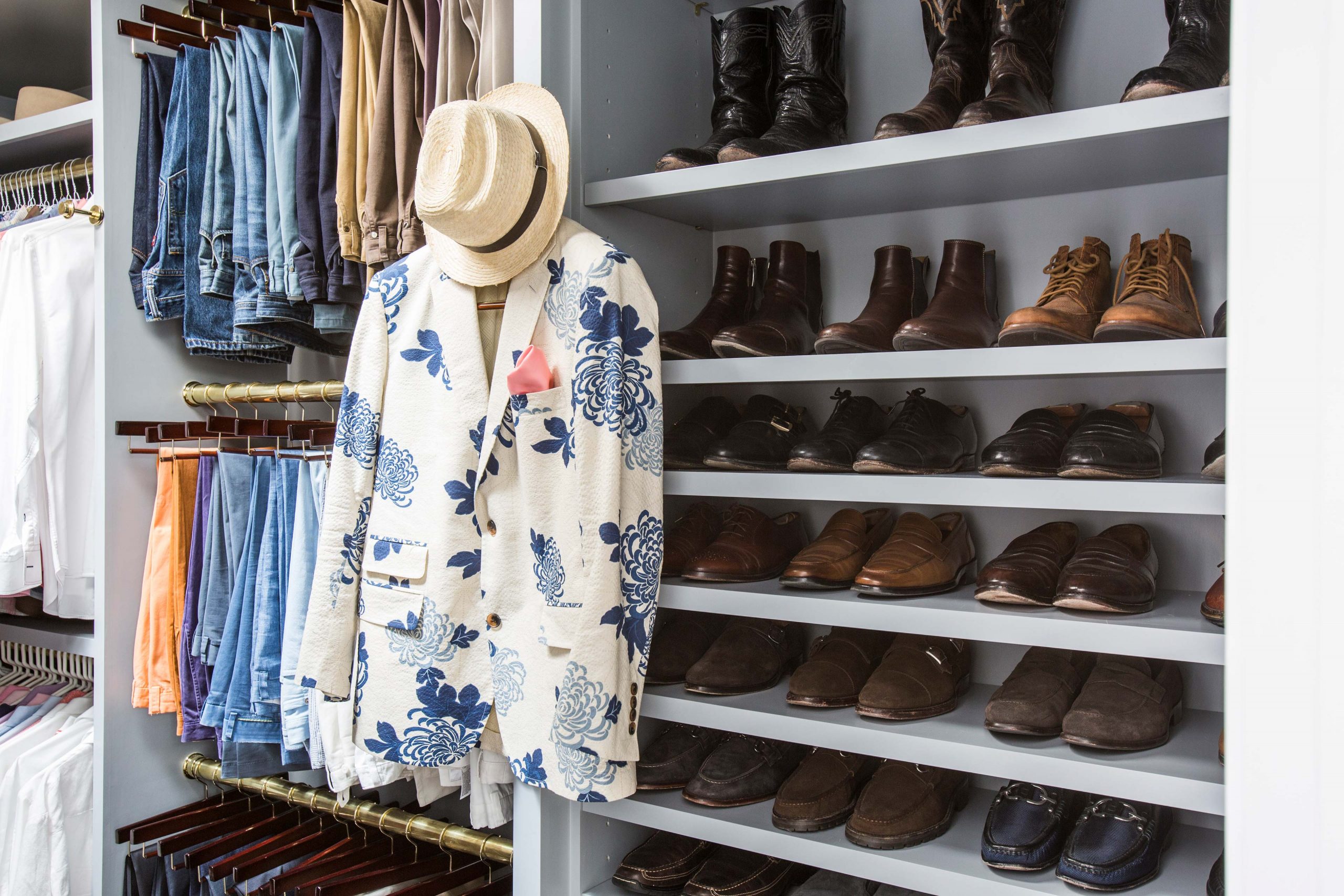 mens walk in closet with shoe space and hanging rack - Creative Tonic