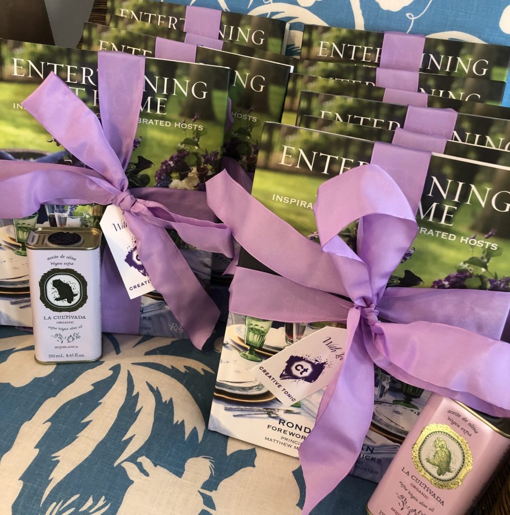 book and olive oil party favor