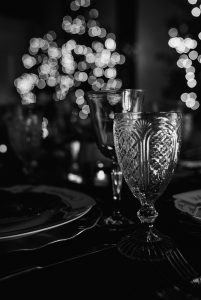 dark candlelit tablescape fine china oscars party