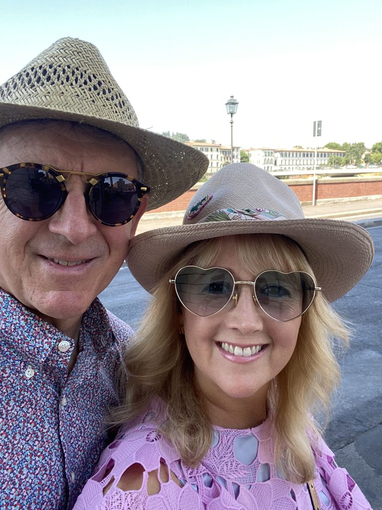 Couple smiling, posing in Florence Italy