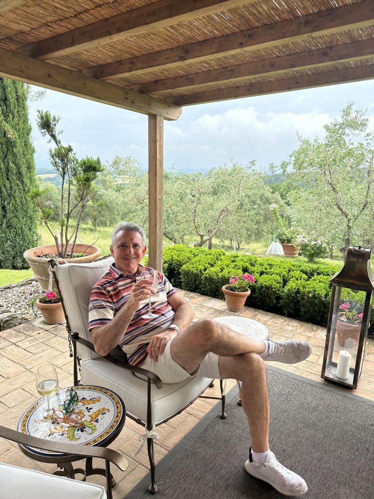 Mr. Creative Tonic relaxes on the villa's patio